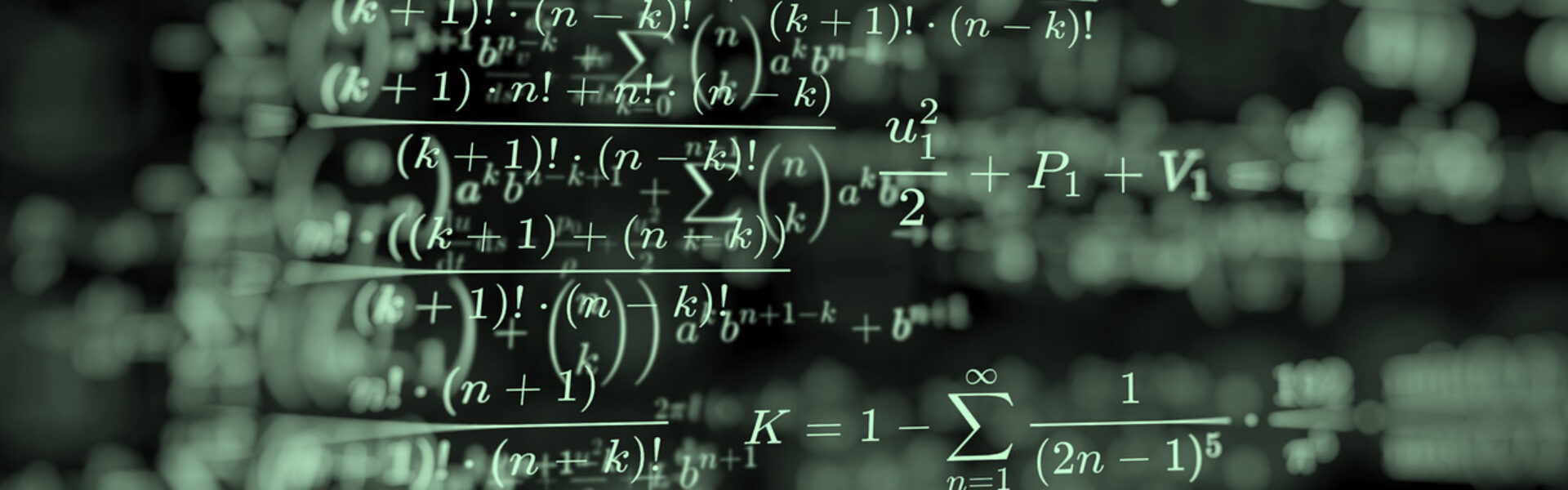 Kvadratsætninger. Matematiske formler på computerskærm med sort baggrund.